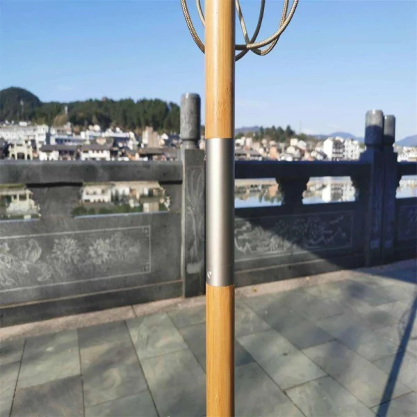 Tall wooden beach umbrella, offering generous shade for patio enjoyment